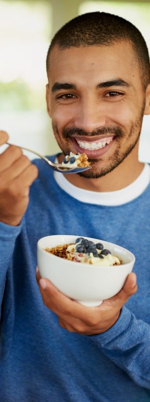 Man,,Portrait,And,Eating,Muesli,Breakfast,In,Home,Or,Healthy